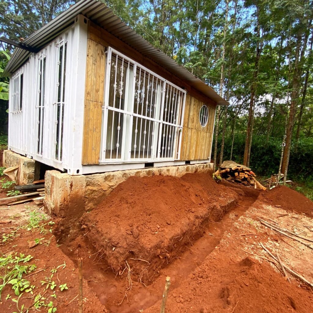 Work in progress deck being built for shipping container home in Kenya